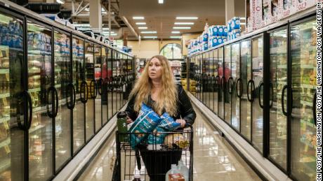 MENLO PARK, CA - NOVEMBER 14: Instacart shopper Vanessa Bain shops for a customer at the Safeway in Menlo Park, California. Bain began a campaign that would lead to a Facebook group of 14,000 Instacart shoppers, about 10 percent of the nationwide total when the company started using default design tricks to decrease the amount shoppers can earn in tips. (Photo by Nick Otto for the Washington Post)